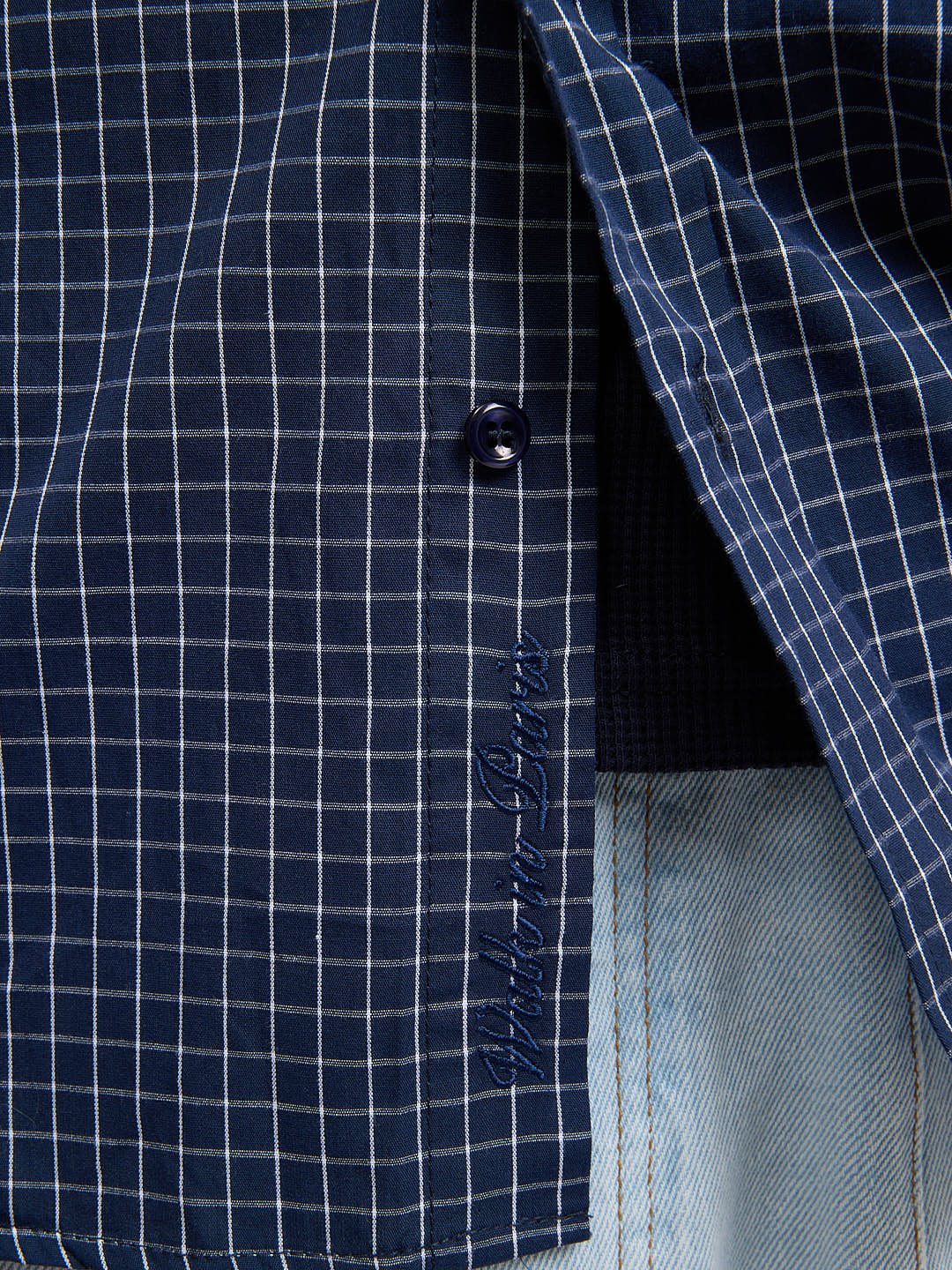 La chemise à carreaux bleue - Image 6